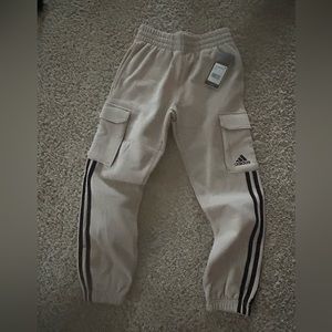 Boys tan adidas cargo joggers.